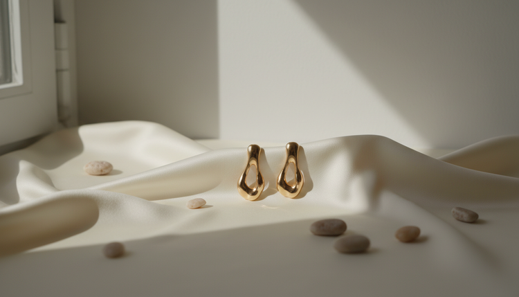 Gold-tone sculpted drop earrings